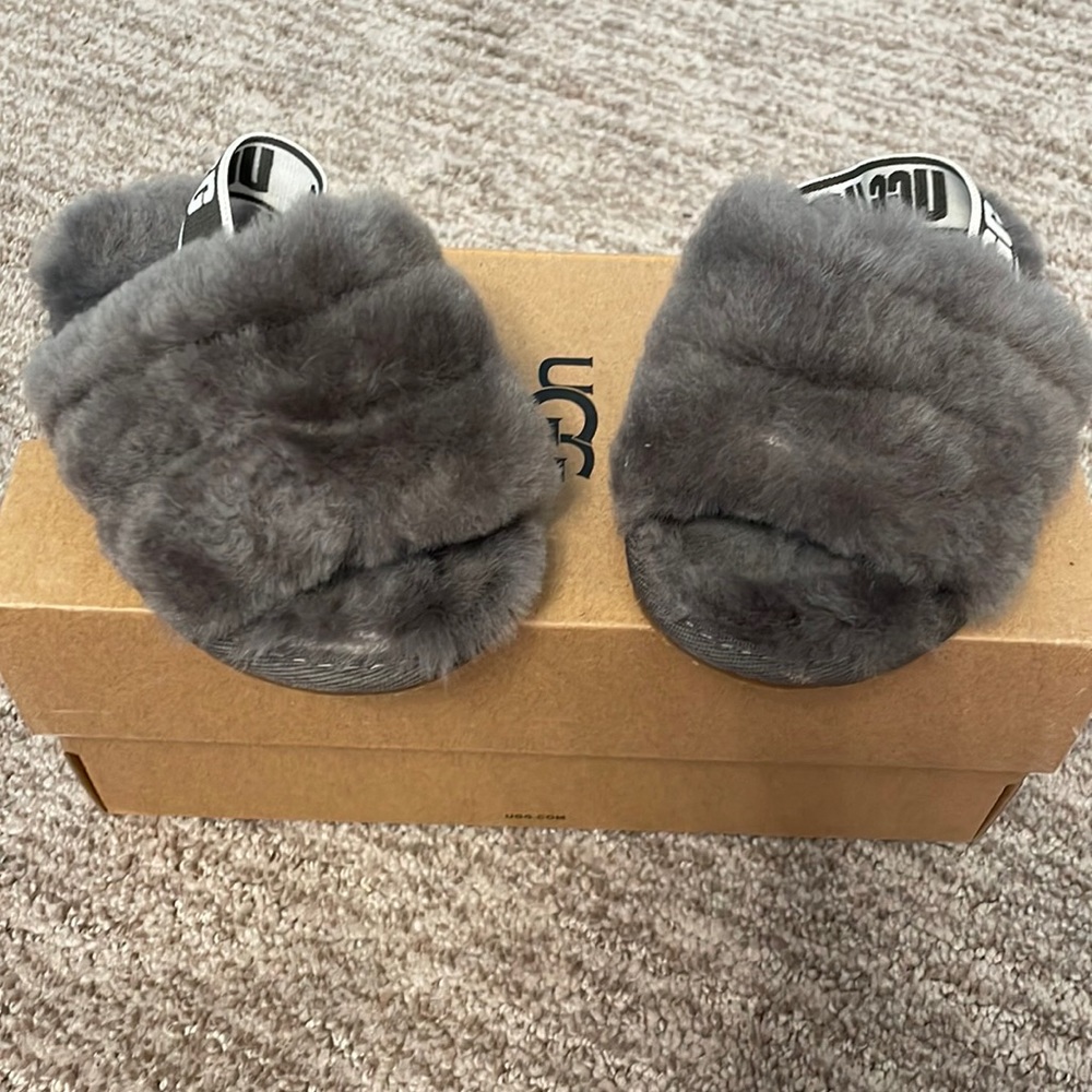 Toddler gray ugg slides with box. Size 7. Worn a few times still looks brand new